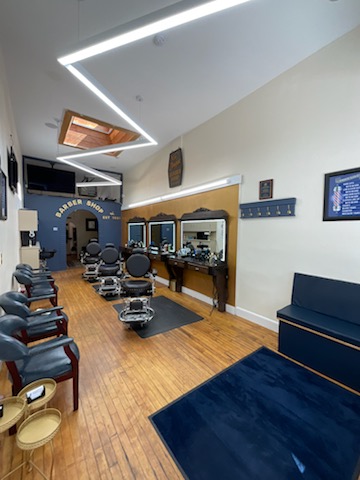 Barbershop interior with barber chairs and mirrors